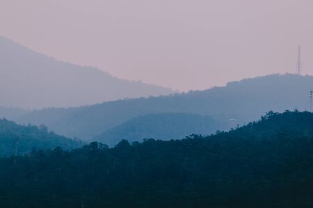 blue hour over the mountains in Tasmania with different layers of mountain ranges in the distance, shot near Mount Wellingtonの写真素材