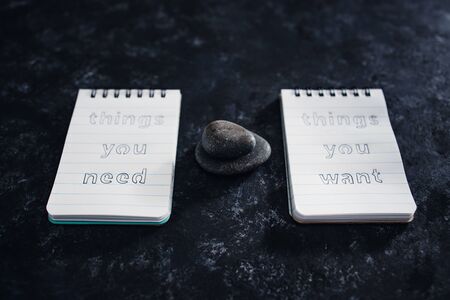 meditation and psychological insights concept, notepads with titles Things you need vs things you...