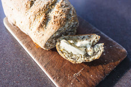 simple food ingredients concept, homemade sourdouhg bread on kitchen counter