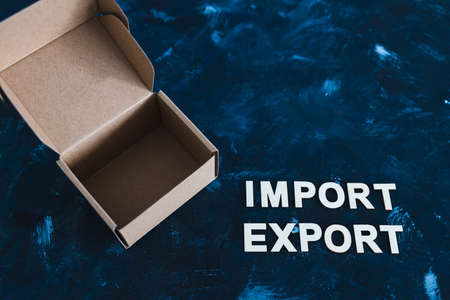 international trade and global business concept, Import Export text next to open parcel box