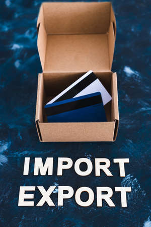 international trade and global business concept, Import Export text next to open parcel box with...