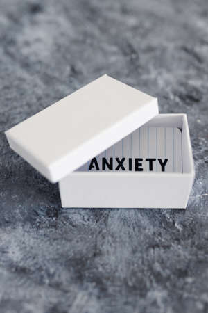 psychology and mental health concept, memo with text Anxiety inside of white box metaphor of mind strugglesの写真素材