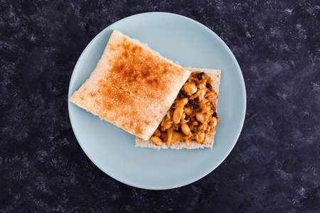 healthy plant-based food recipes concept, vegan butter bean and cauliflower sandwich with paprika...