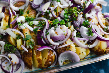 healthy plant-based food recipes concept, vegan potato bake with spanish onions and dairy-free cream...