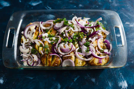 healthy plant-based food recipes concept, vegan potato bake with spanish onions and dairy-free cream...