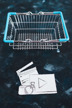 creative content sold online conceptual image, photo and video digital downloads icon in shopping...