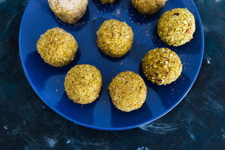 healthy plant-based food recipes concept, homemade fried vegan pesto risotto balls aranciniの写真素材