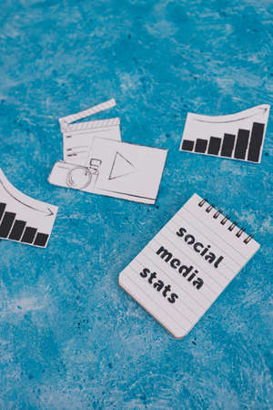 creative content and social media success conceptual image, photo and video digital content icon with stats going both up and downの写真素材