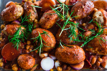 healthy plant-based food recipes concept, vegan potato and onion roast with chickpeas tomato sauce...