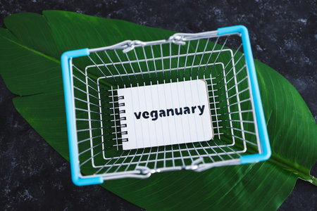 HOBART, AUSTRALIA - january 2nd, 2021: healthy plant-based nutrition concept, Veganuary memo inside...