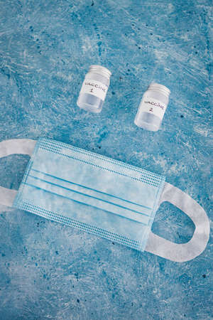 vaccine and immunisation against the pandemic, ampoules with Vaccine 1 and Vaccine 2 labels side by...