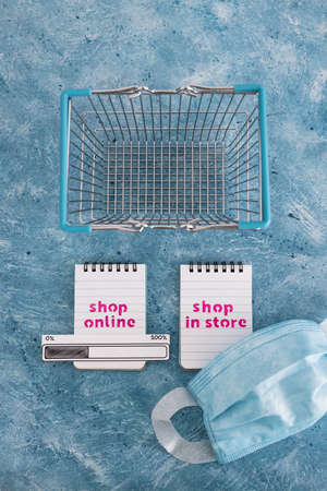 competition and retail industry conceptual image, shop in store with mask vs shop online with...