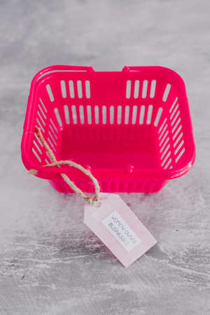 women-owned businesses tag with pink shopping basket, supporting equality and equal opportunitiesの写真素材