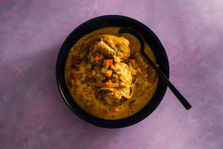 vegan roast whole potatoes with curry sauce and mixed vegetables, healthy plant-based food recipes