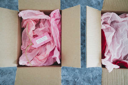 women-owned businesses tag inside with order delivery parcel, supporting equality and purchasing...
