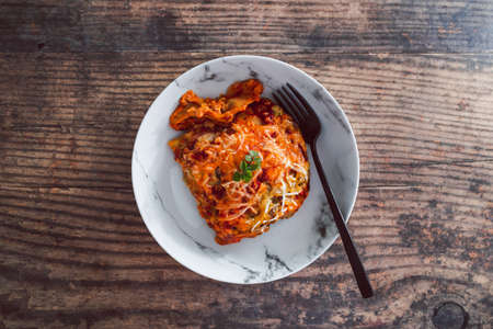 vegan lasagne with lentil bolognese sauce and homemade dairy free bechamel sauce, healthy...