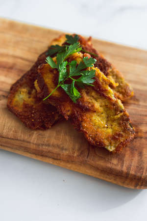 vegan fried bread crumbed zucchini slices, healthy plant-based food recipesの写真素材