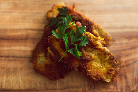 vegan fried bread crumbed zucchini slices, healthy plant-based food recipesの写真素材