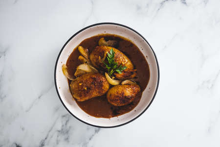 vegan roasted potatoes and onion with gravy, healthy plant-based food recipes