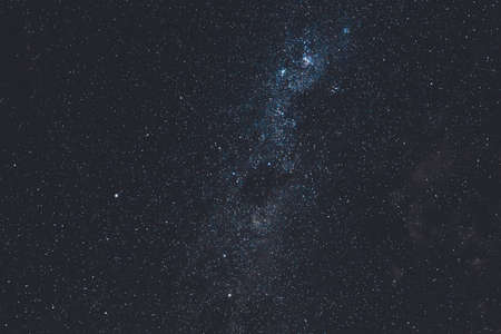 starry night sky with plenty of constellations and milky way clearly visible shot from the Southern Hemisphere in Tasmania, Australia in autumnの写真素材