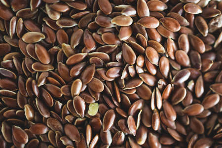 flaxseeds close-up shot of pantry ingredients, concept of simple toppings to flavour your dishesの写真素材