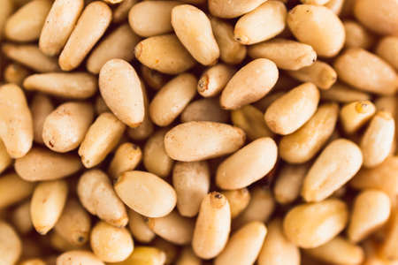 pine nuts close-up shot of pantry ingredients, concept of simple toppings to flavour your dishesの写真素材