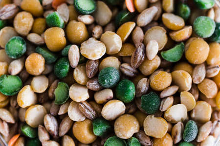 spice jar with lentil and bean soup mix close-up shot of pantry ingredients, concept of simple...