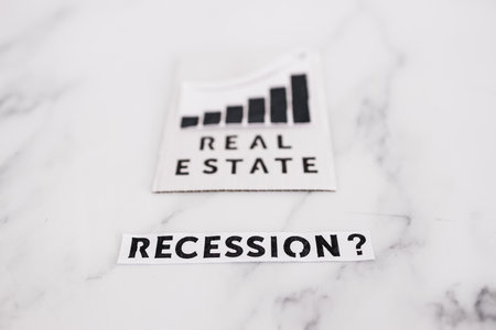 recession text with question mark next to real estate stats going up, concept of post pandemic economyの写真素材