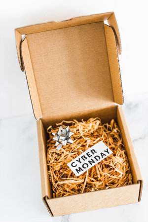promotions and shopping deals over the festive season, parcel or gift box with Cyber Monday label...