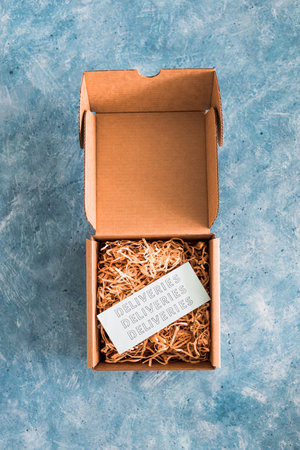online shopping and shipping over the festive season, parcel or gift box with Deliveries label...