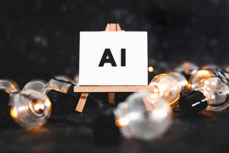 AI text on canvas on easel with light bulbs around it, art and machine learning concept, image NOT generated with AIの写真素材