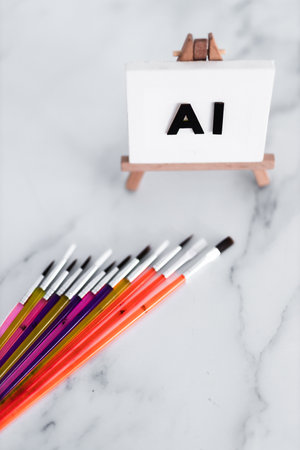 AI text on canvas on easel with brushed around it, art and machine learning concept, image NOT generated with AIの写真素材