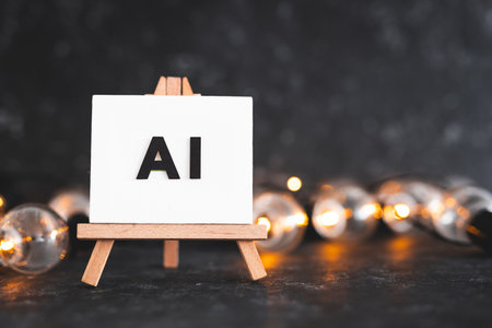 AI text on canvas on easel with light bulbs around it, art and machine learning concept, image NOT generated with AIの写真素材