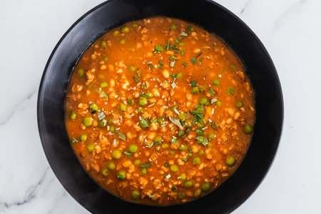 plant-based barley and peas curry with tikka masala sauce, healthy vegan food recipesの写真素材