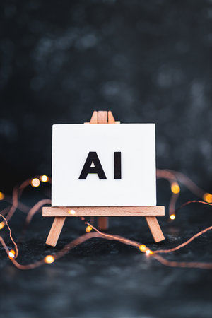 AI text on miniature canvas on easel on dark background with fairy lights, concept of art and machine learning, image NOT generated with AIの写真素材