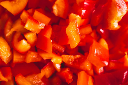 diced red bell peppers close-up, concept of simple natural healthy ingredientsの写真素材