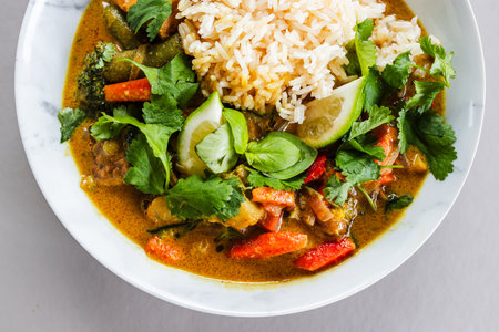 plant-based satay vegetable curry with rice, healthy food recipesの写真素材