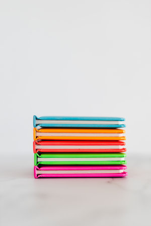 colourful children books piled on minimalistic setup, concept of learning to read, early education,...