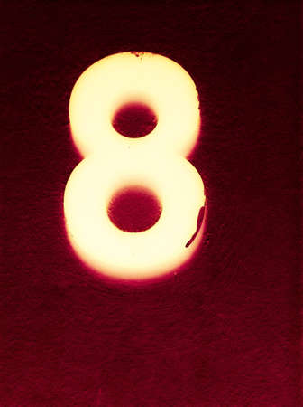 Number eight glowing in the darkの素材