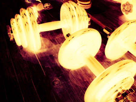Dumbbells glowing at nightの素材