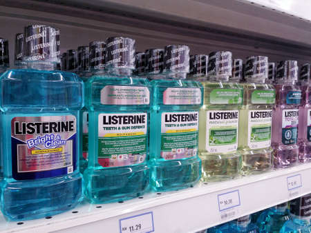 KUALA LUMPUR,MALAYSIA - MAY 20,2017 : Various of Listerine product displayed at supermarket.Listerine is an American brand of antiseptic mouthwash product, founded in 1879 in St.Louis,Missouri.のeditorial素材