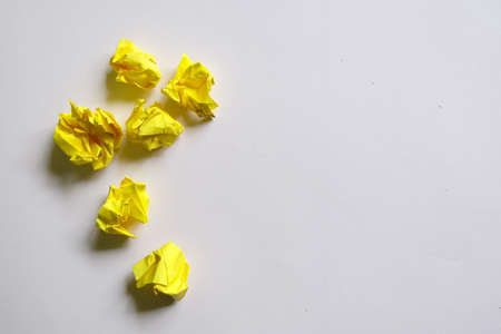 Top view of six yellow crumpled paper isolated on white background with copy space for text.の写真素材