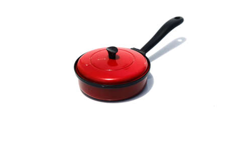 Miniature frying pan isolated on white background.の写真素材