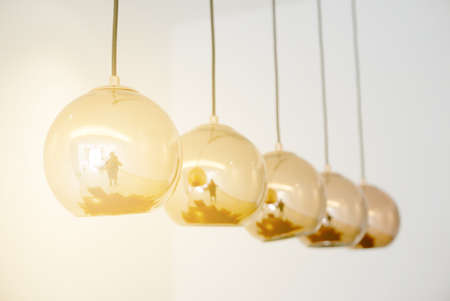 Gold color design of hanging lamp.の写真素材