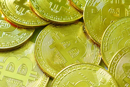 Many golden bitcoin replica. Business and finance concept.