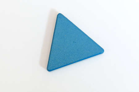 Blue color magnet isolated on white background.