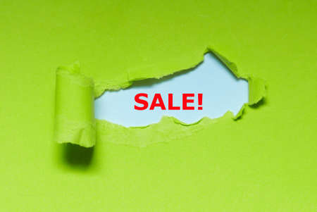 UFO green torn paper written with SALE!.の写真素材