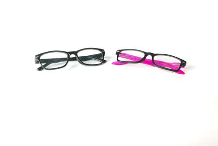 Black frame sunglasses with black and pink sunglasses isolated on white background.
