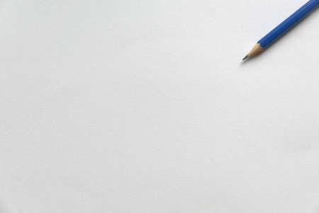 Pencil on white paper background. Copy paste for text, logo and etc.の写真素材
