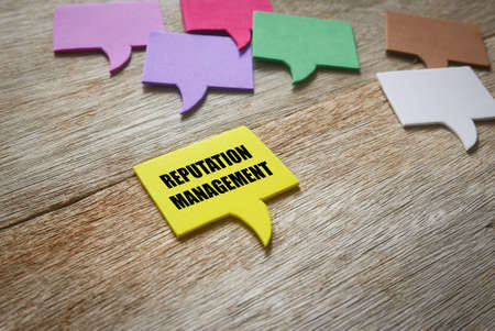 A colorful of speech bubble with one of it written with Reputation Management on wooden background.の写真素材